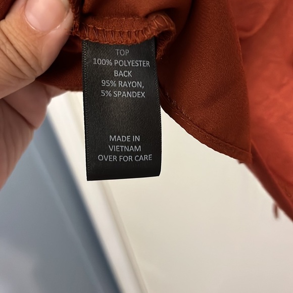 By&By burnt orange top with v neck and x pattern on the front with a tie - Picture 5 of 5